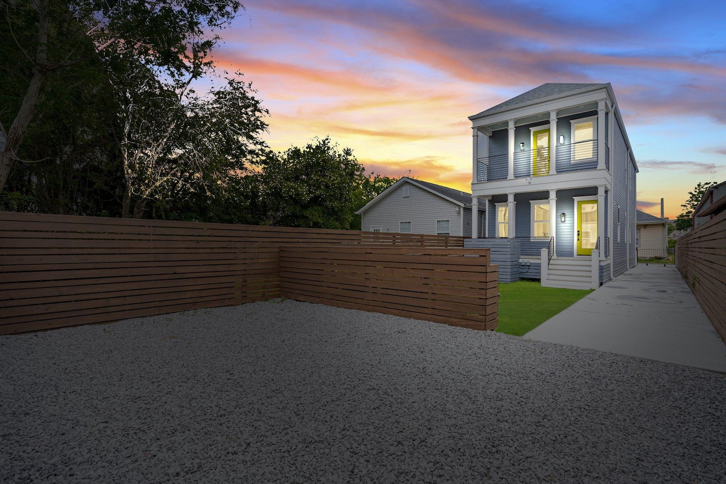 Parking for 2 vehicles in the Gravel area and another in the driveway next to the grass!