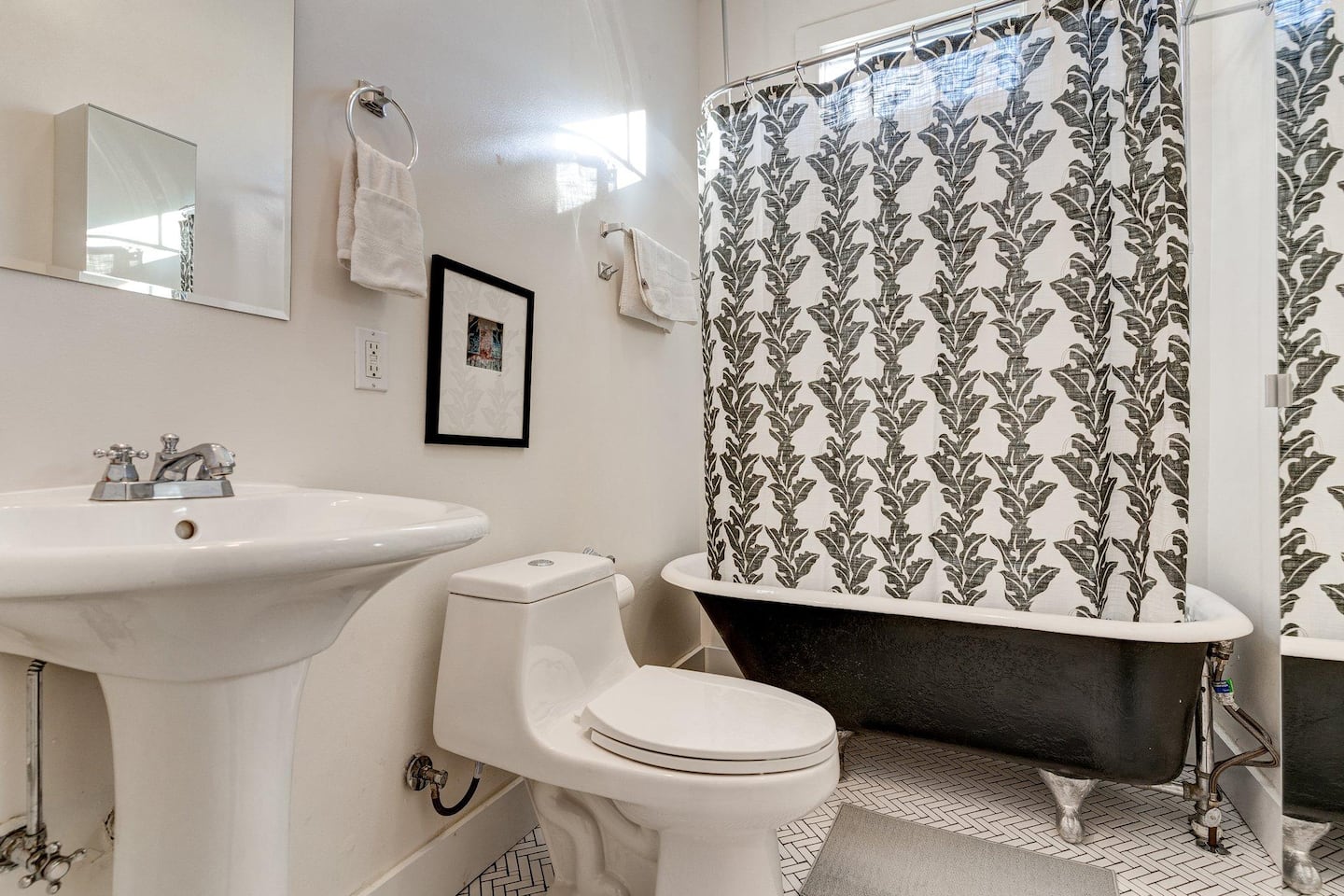 clawfoot tub in our fully stocked bathroom