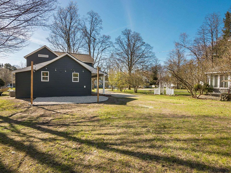EXTERIOR:  The backyard in Spring