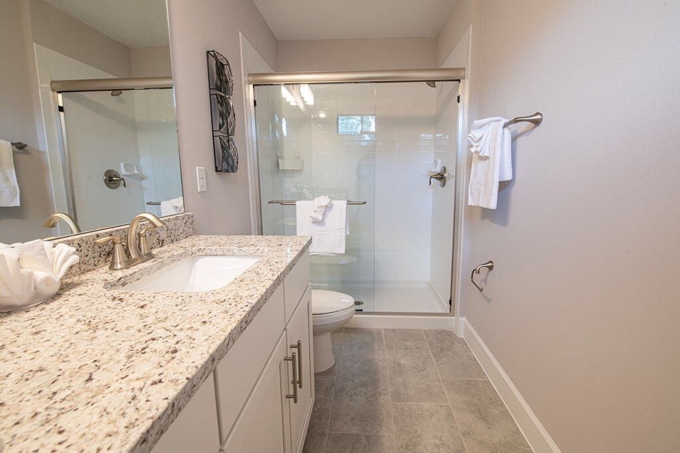 Our  spacious master bathroom comes with all the basics. Enjoy a relaxing shower, a refreshing retreat after a day of adventures.