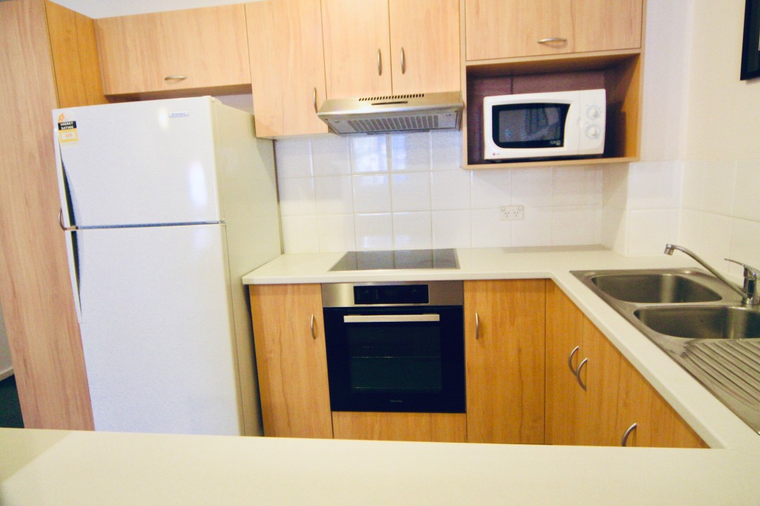 Full kitchen with pantry basics, laundry facilities, and an outdoor clothesline support extended visits or family stays.