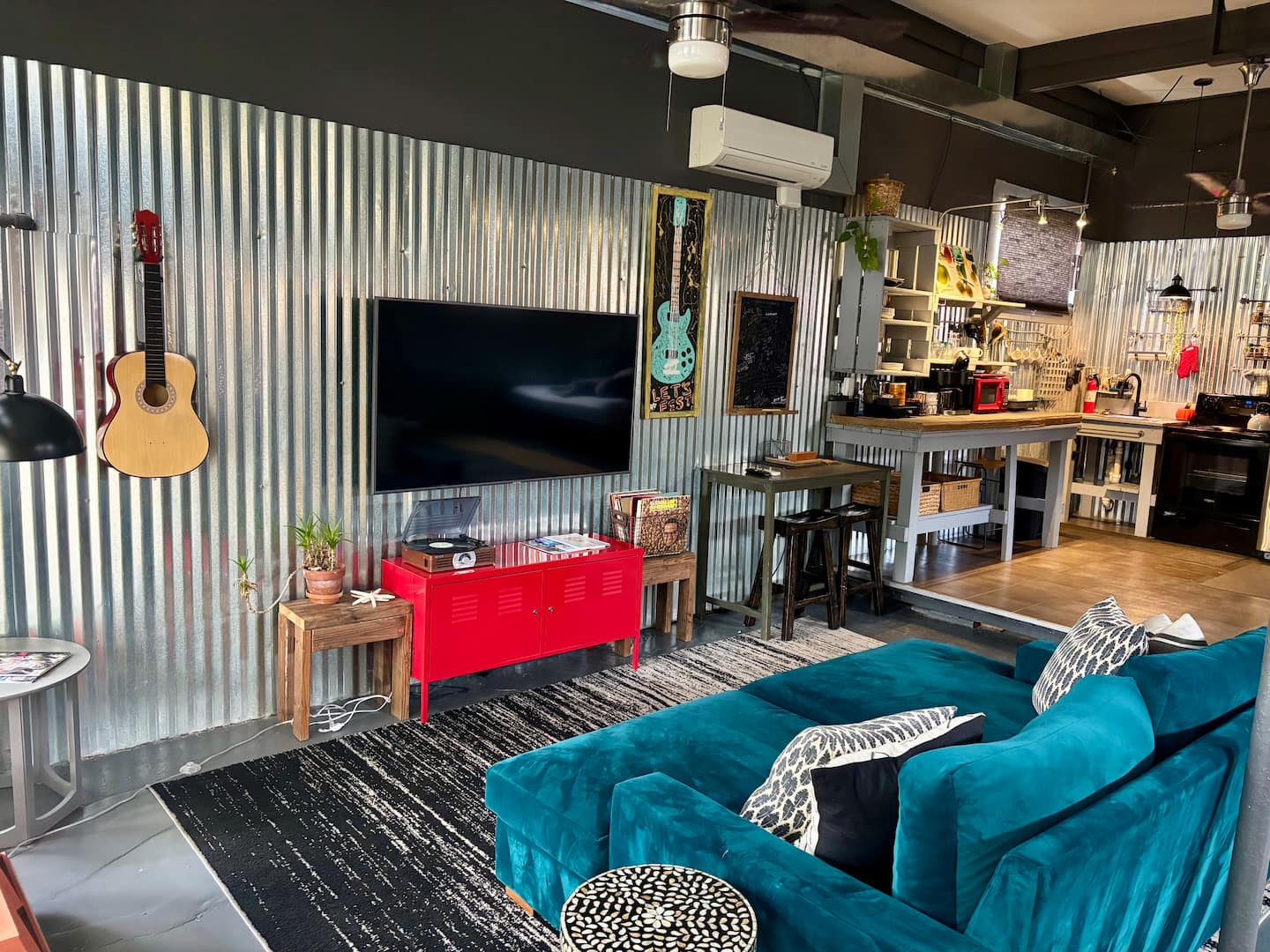 Modern industrial vibes with a touch of home - unwind, recharge, and enjoy the rhythm of this unique space.