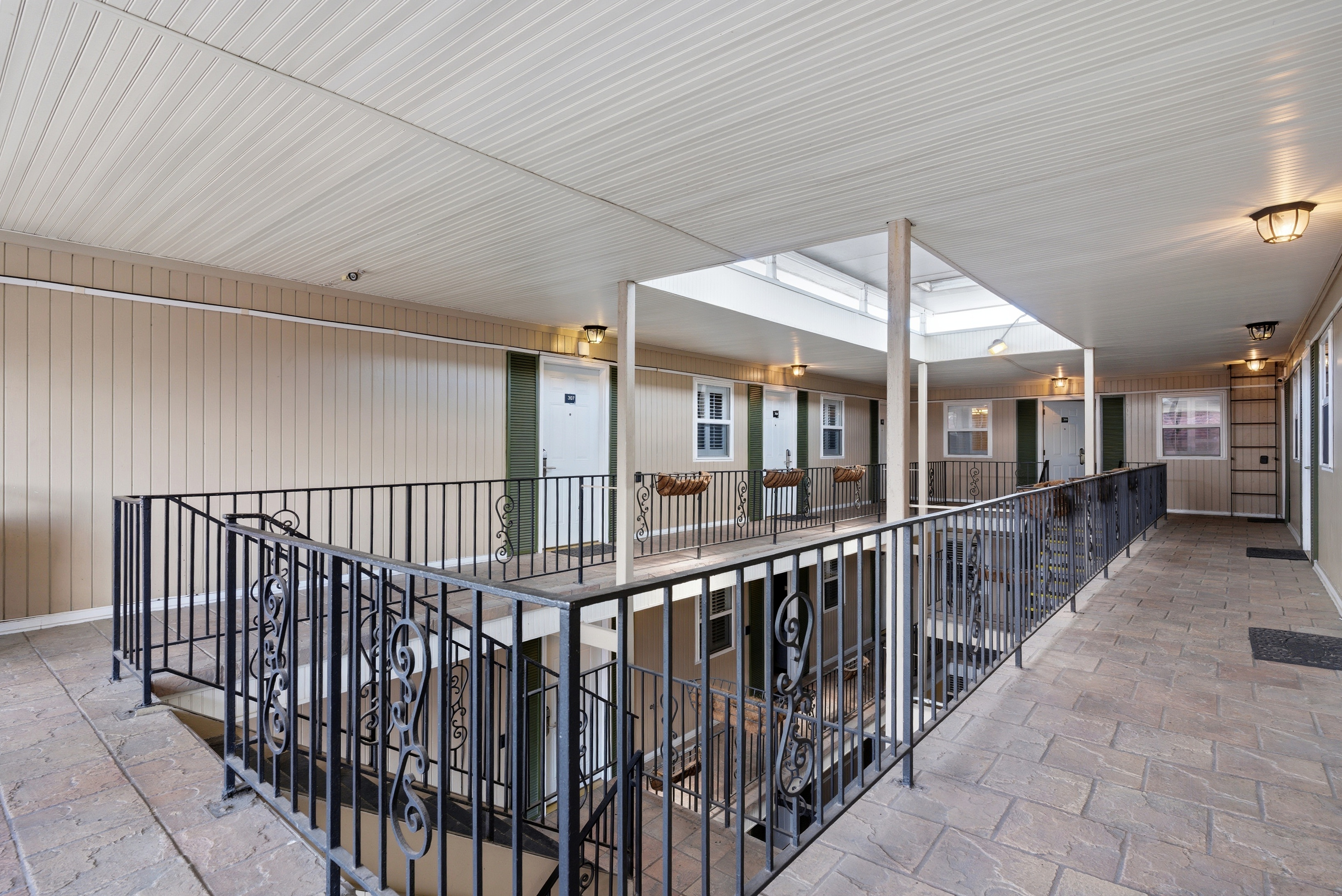 Open air walkways with relaxed courtyard charm