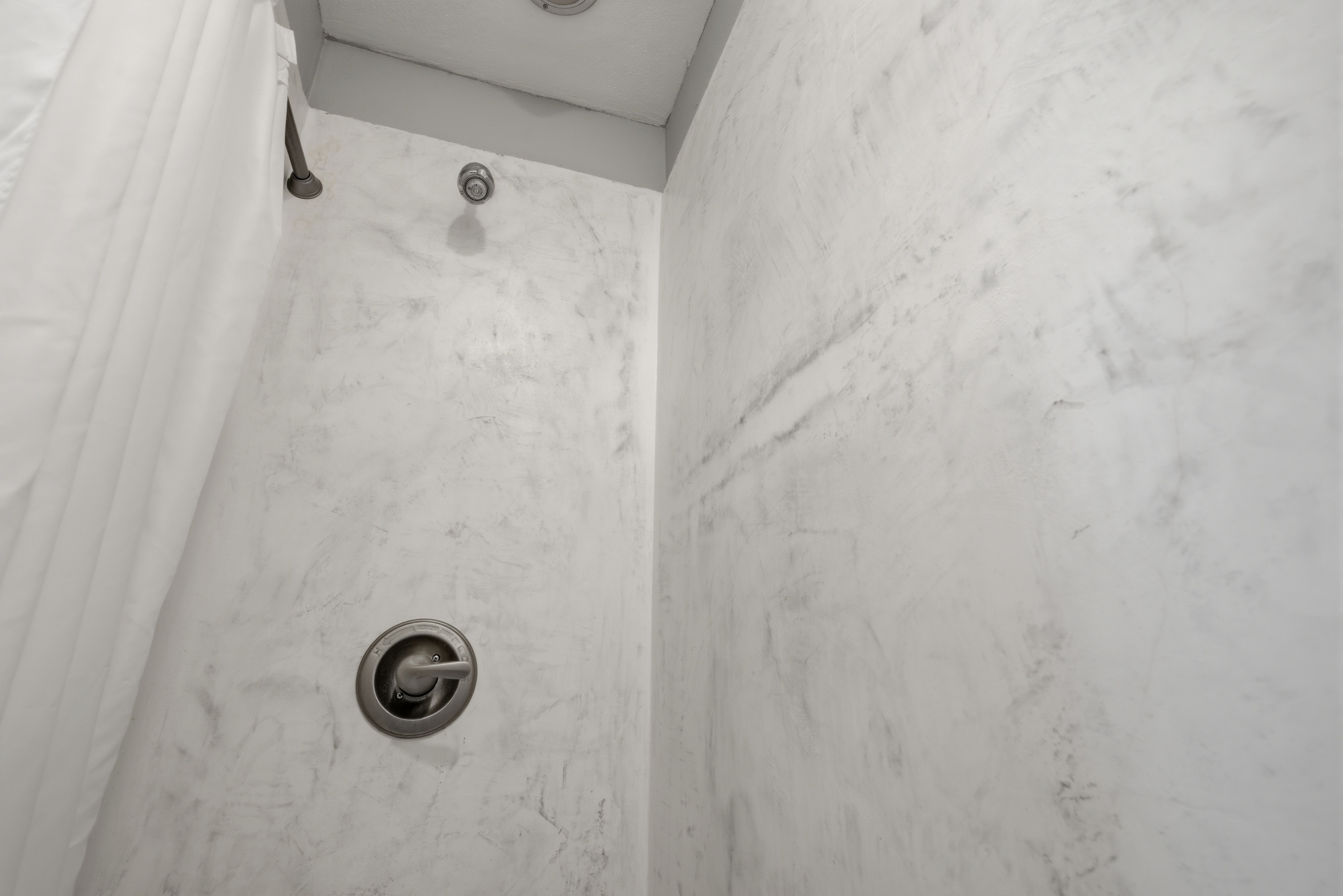 Crisp bathroom designed for comfort