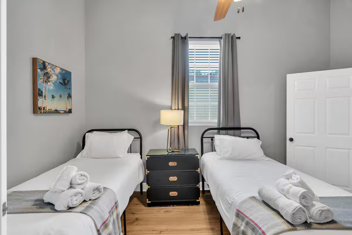 Bedroom 3 features two comfy single beds, making it a great setup for kids, friends, or travel companions. Bright, simple, and thoughtfully arranged for a restful stay.