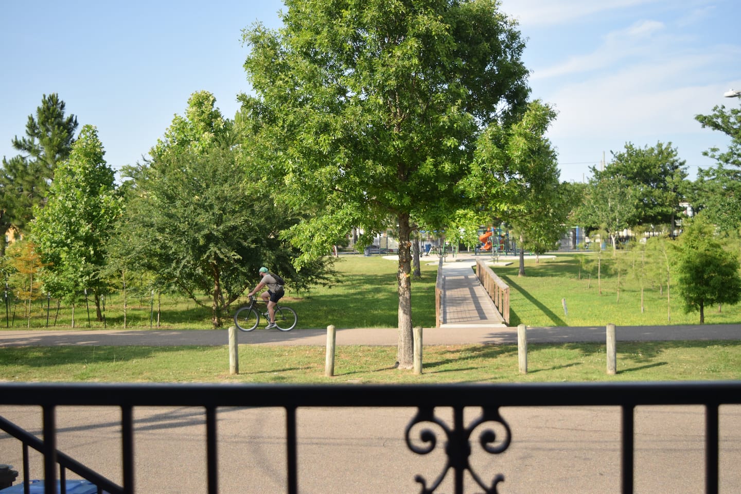 Steps to the scenic Lafitte Greenway, perfect for biking, walking, or enjoying the lush green surroundings right outside your door.