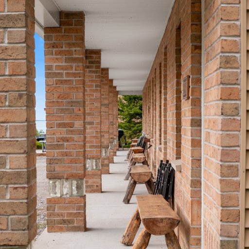 Private entry with outdoor space and views of the lake just beyond.