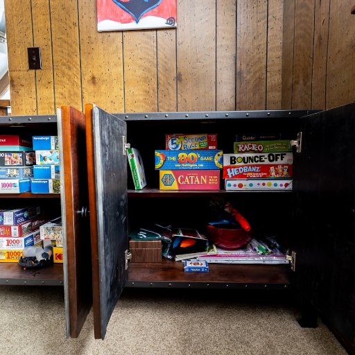 Stay entertained with a fully stocked cabinet of board games and fun activities for all ages