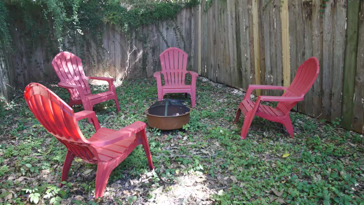 Backyard with seating arrangements with fire pit