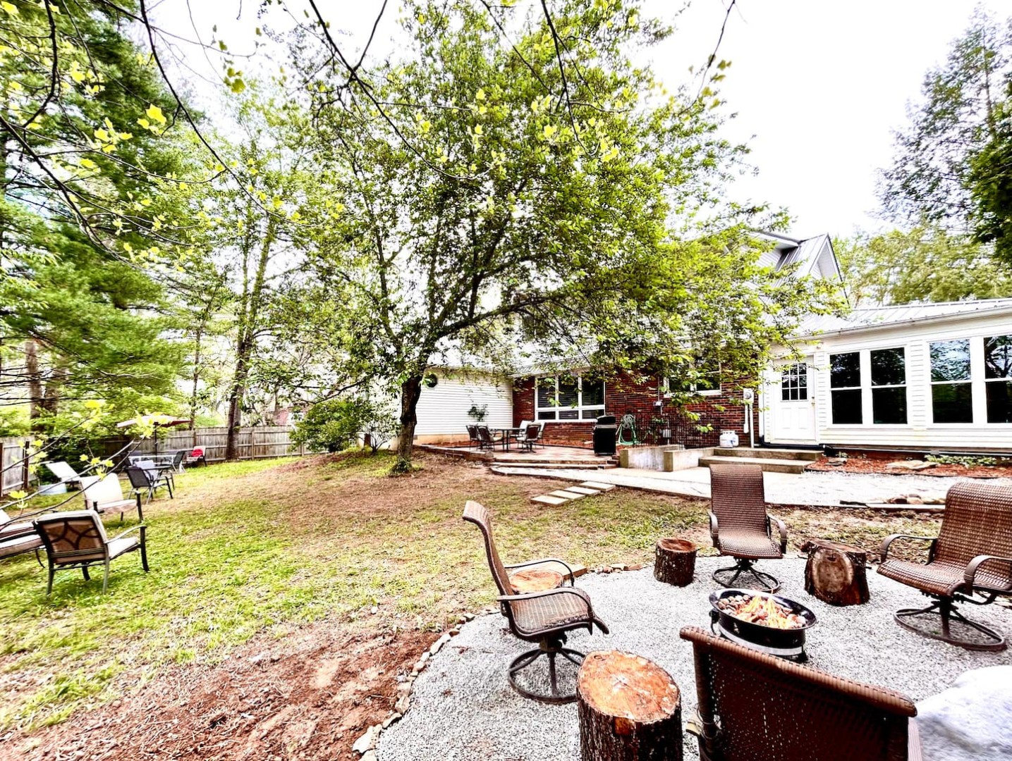 Backyard fire pit and stone patio