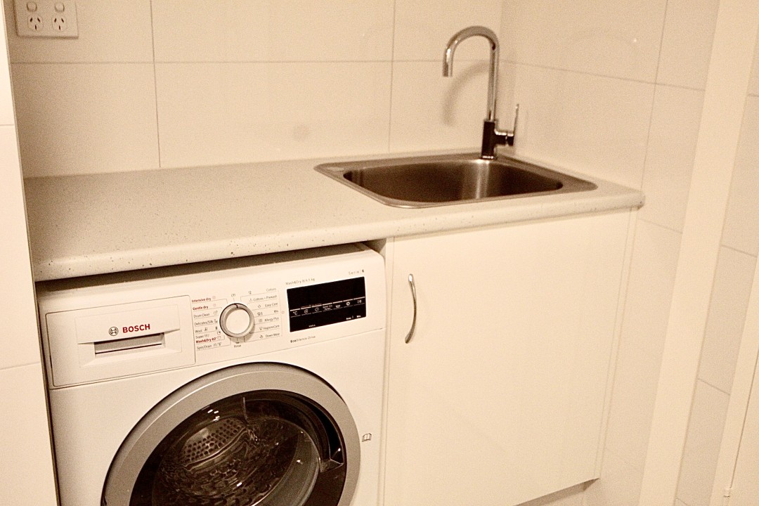 Equipped with a washing machine, dryer, and outdoor clothesline—perfect for long-term stays and family comfort.