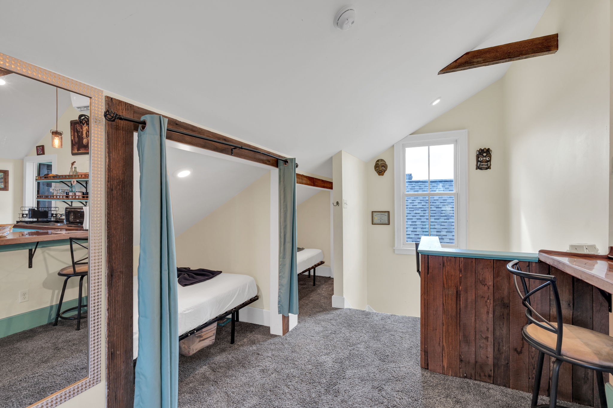 Inviting guest room with soft lighting and cozy linens.