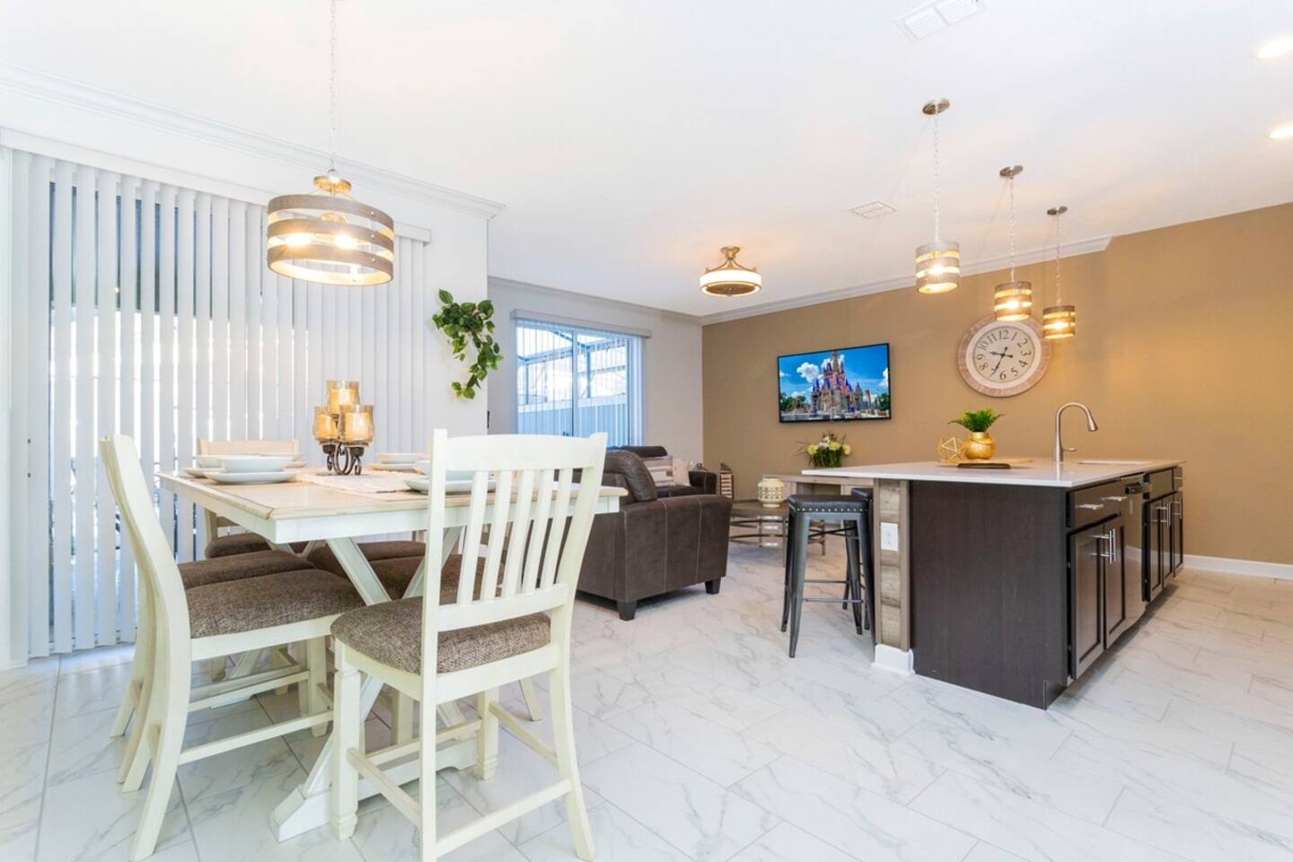 Open living space that seamlessly connects the beautiful kitchen and dining area, offering a perfect blend of comfort and style.
