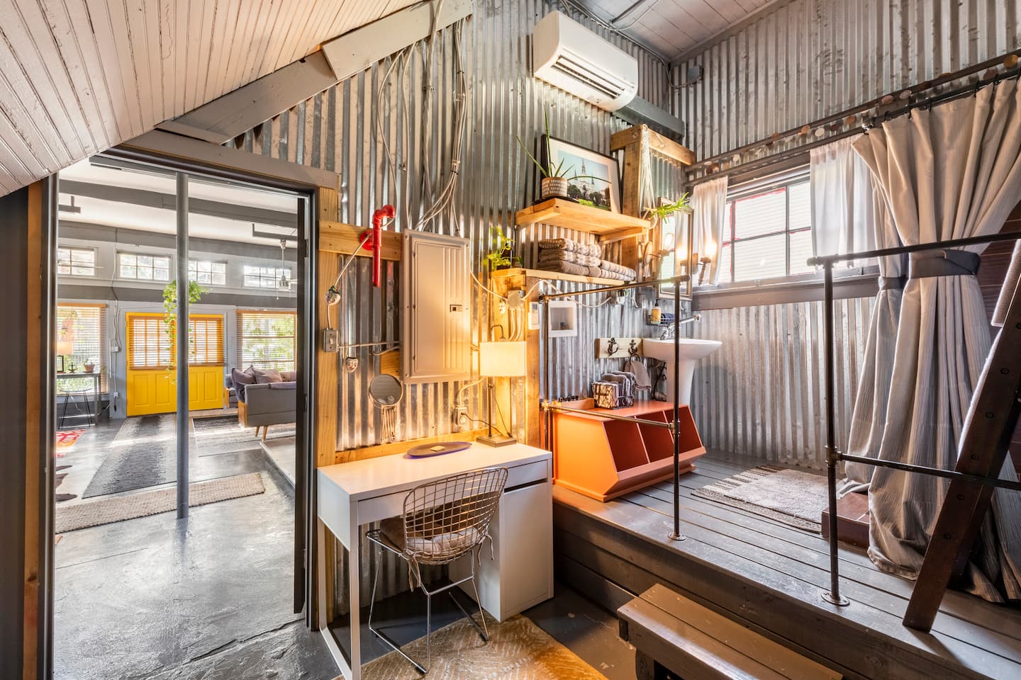 The bathroom offers practicality and convenience with a touch of vibrant charm.