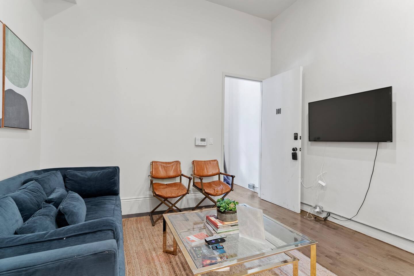 Living room space equipped with a TV perfect for viewing netflix