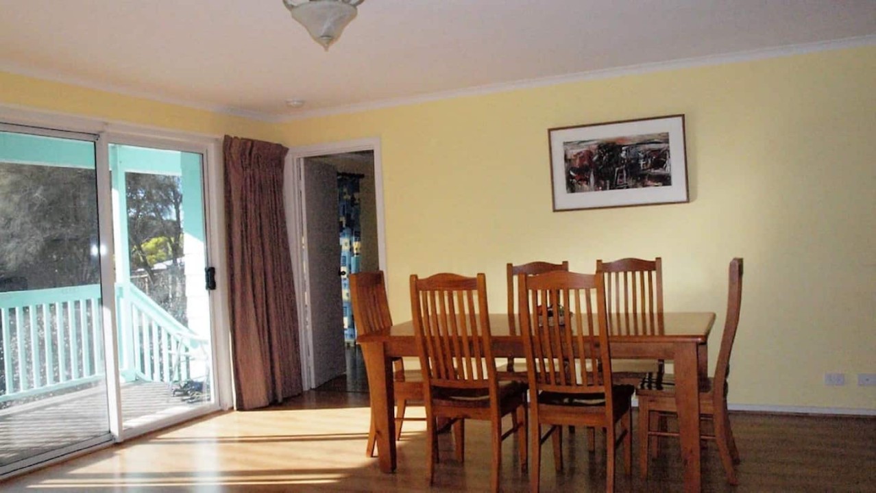Indoor dining area comfortably seats the whole group for shared meals.