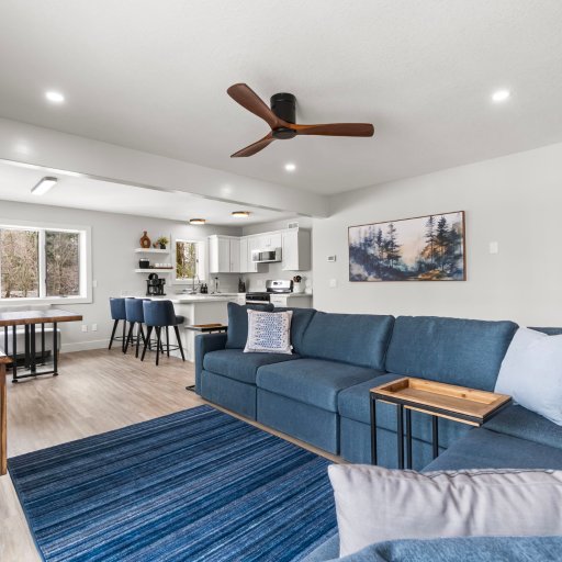 Open-concept main floor — living, kitchen, and breakfast nook