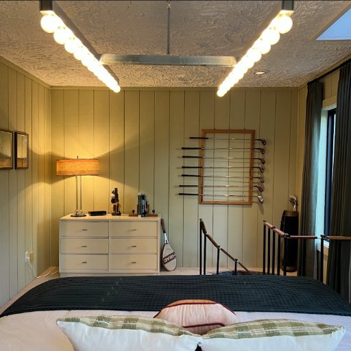 The Hole-In-One — golf club rack, dresser, and the ladder up to the Eagles Nest