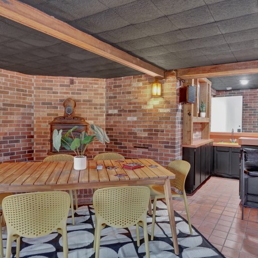 Relaxation space adjacent to the pool with indoor-outdoor feel.