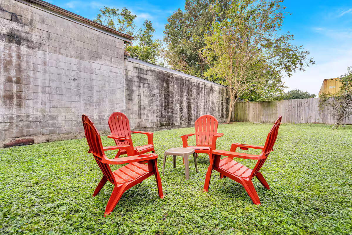 Backyard with seating arrangements.