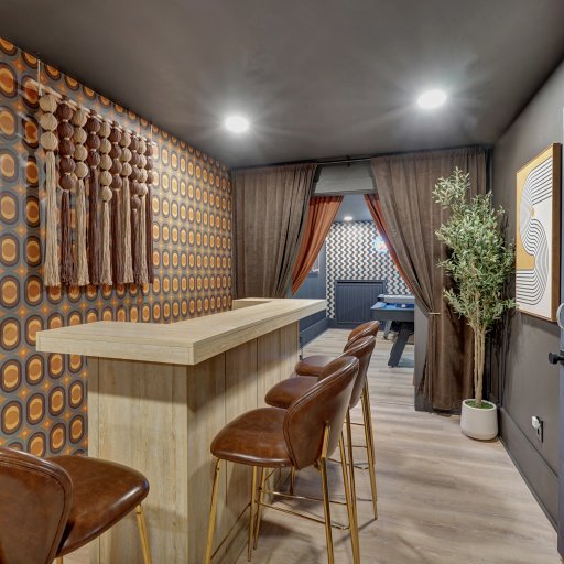 Second bar with seating, just off the game room.