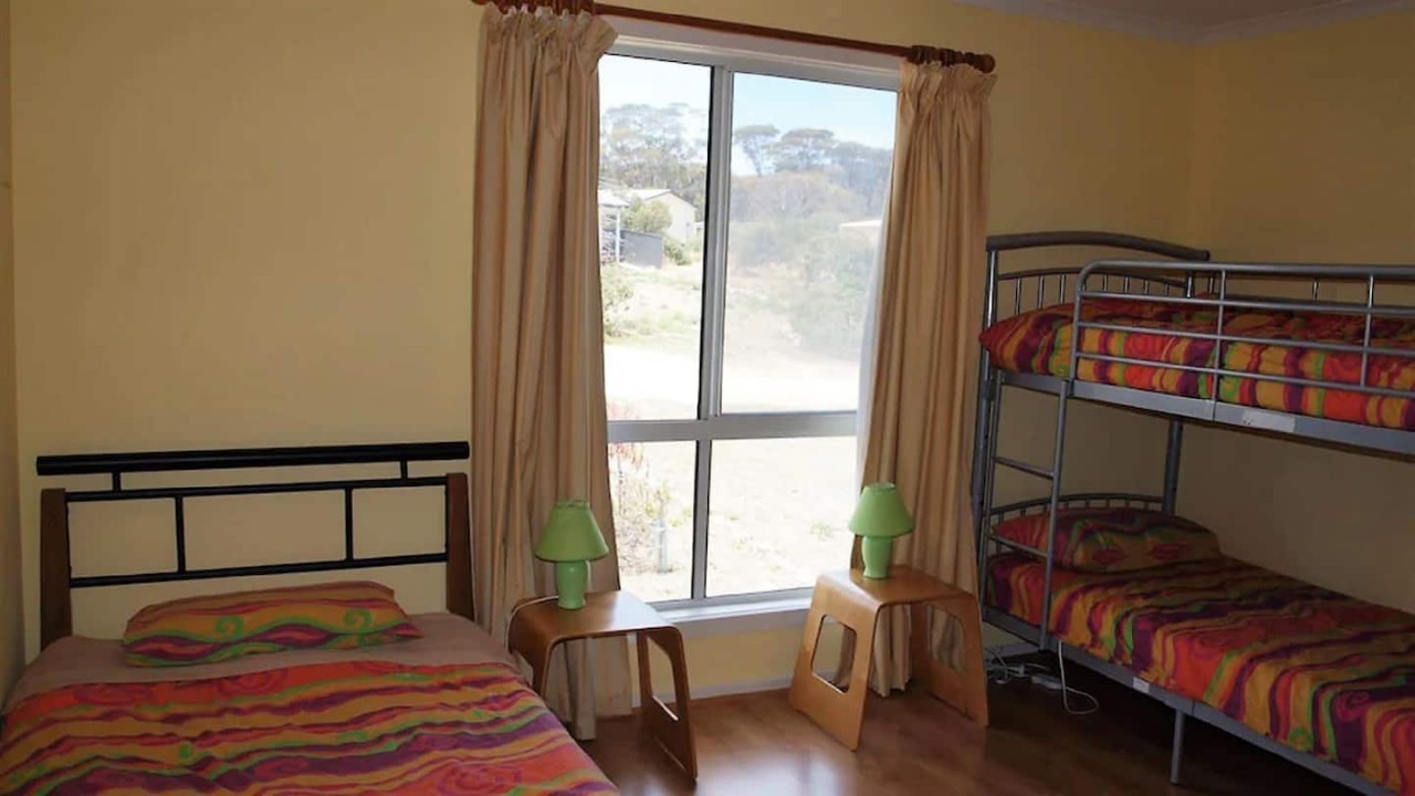 Spacious Accommodation – Three bedrooms plus three new sofa beds and a full-size cot, comfortably accommodating larger families or groups. Third bedroom: King single bed and a bunk bed