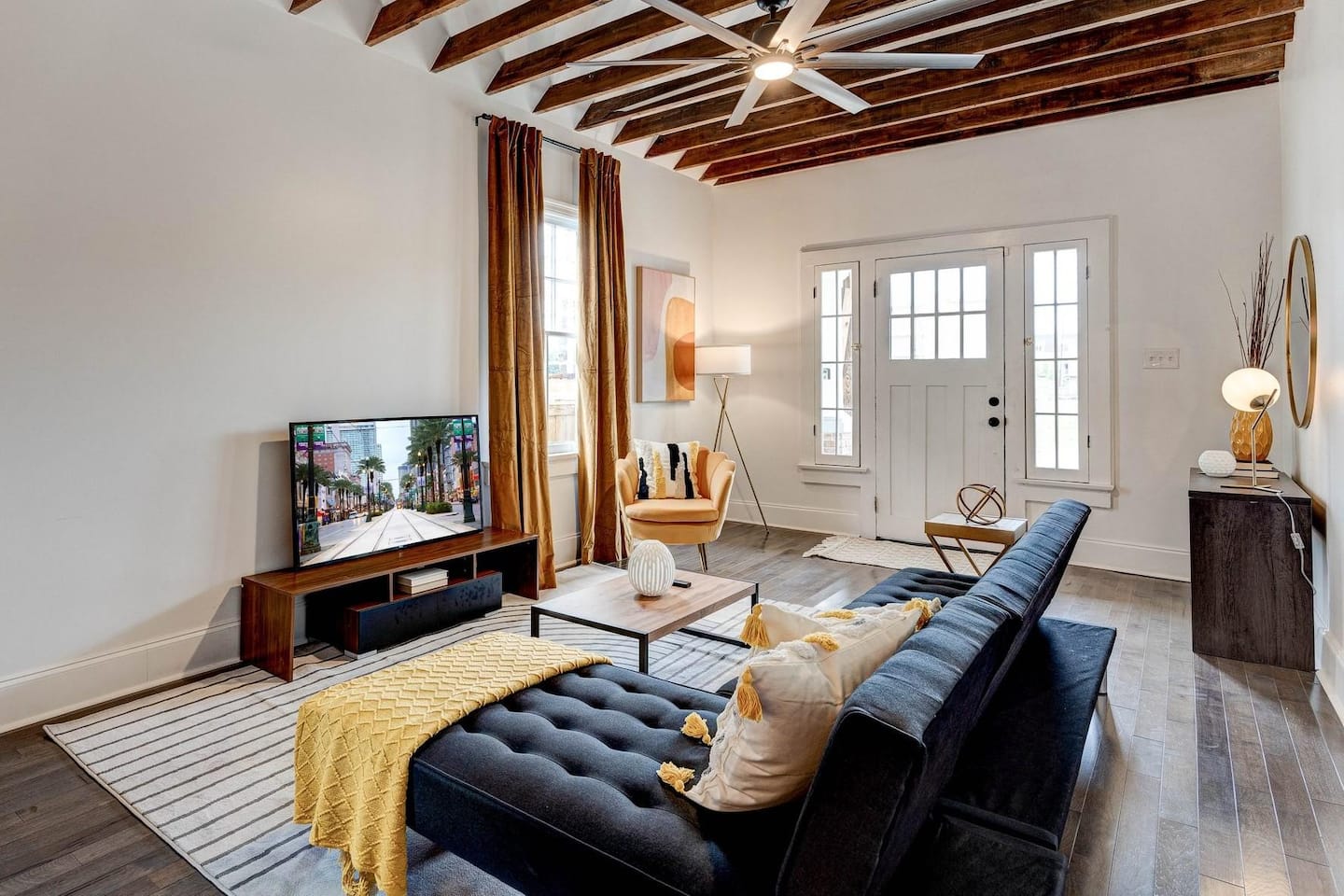 Living room space equipped with tv perfect for enjoying netflix