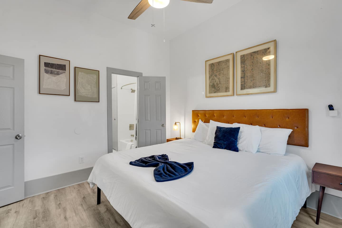 Unwind in this cozy retreat featuring a plush king bed, soft linens, and a serene ambiance. With elegant decor, modern amenities, and a private en-suite bath, it's the perfect place to relax after a day of exploring!