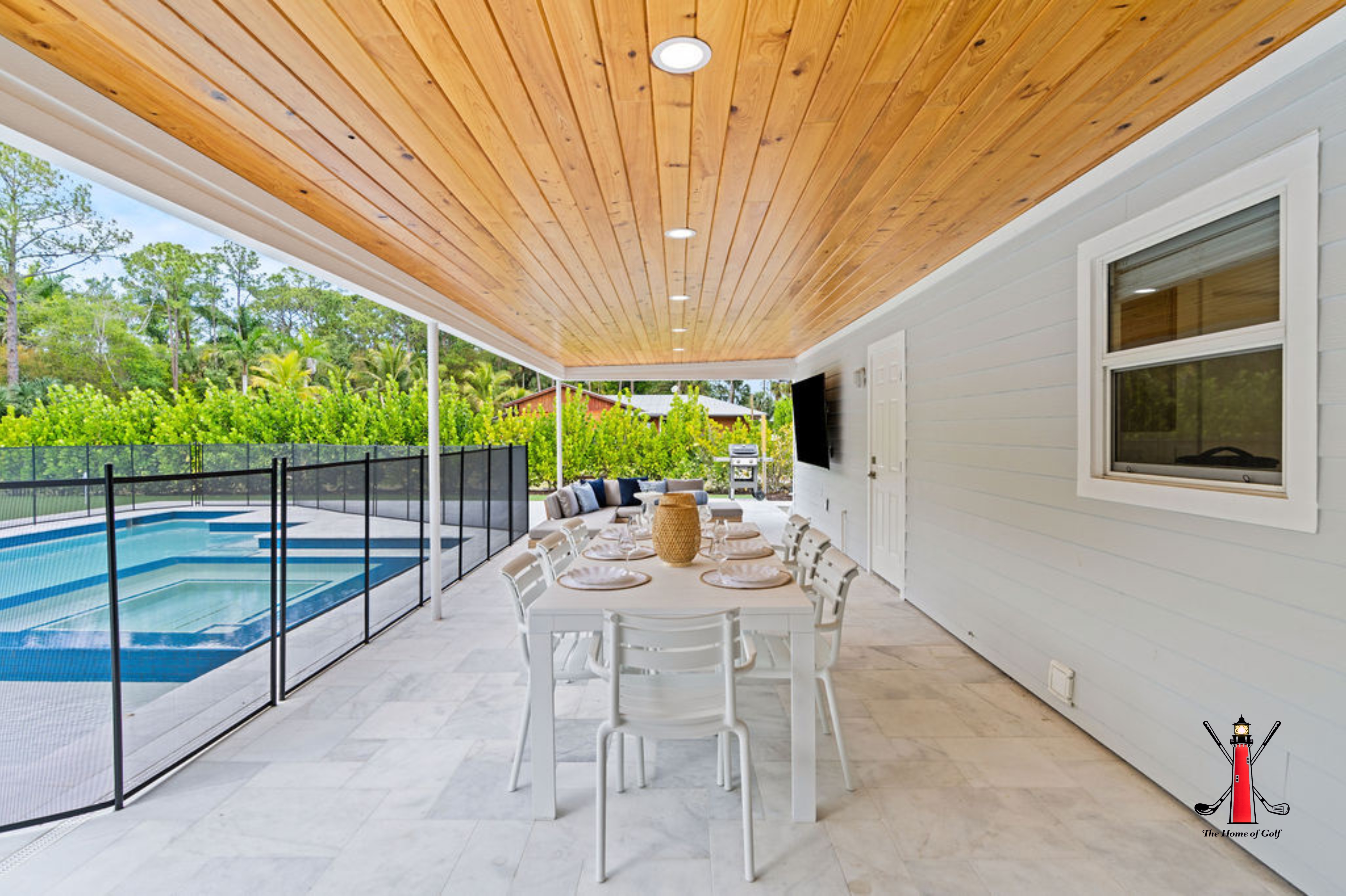 Dine al fresco under the beautiful wood-paneled ceiling while enjoying the Florida breeze.