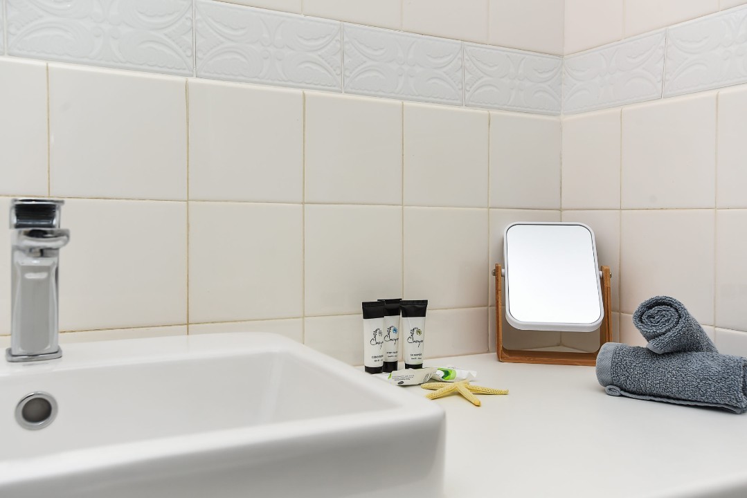 To get you started, we provide a small selection of basic supplies and welcome amenities upon check-in. These typically include essentials such as toilet paper, soap, shampoo, and a few other household basics. Please note that these items are provided as a complimentary starter pack and are not replenished throughout your stay