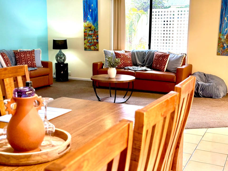 Sunlit Open-Plan Living Area
Light-filled lounge with stylish, comfortable furnishings, perfect for relaxation and communal downtime.