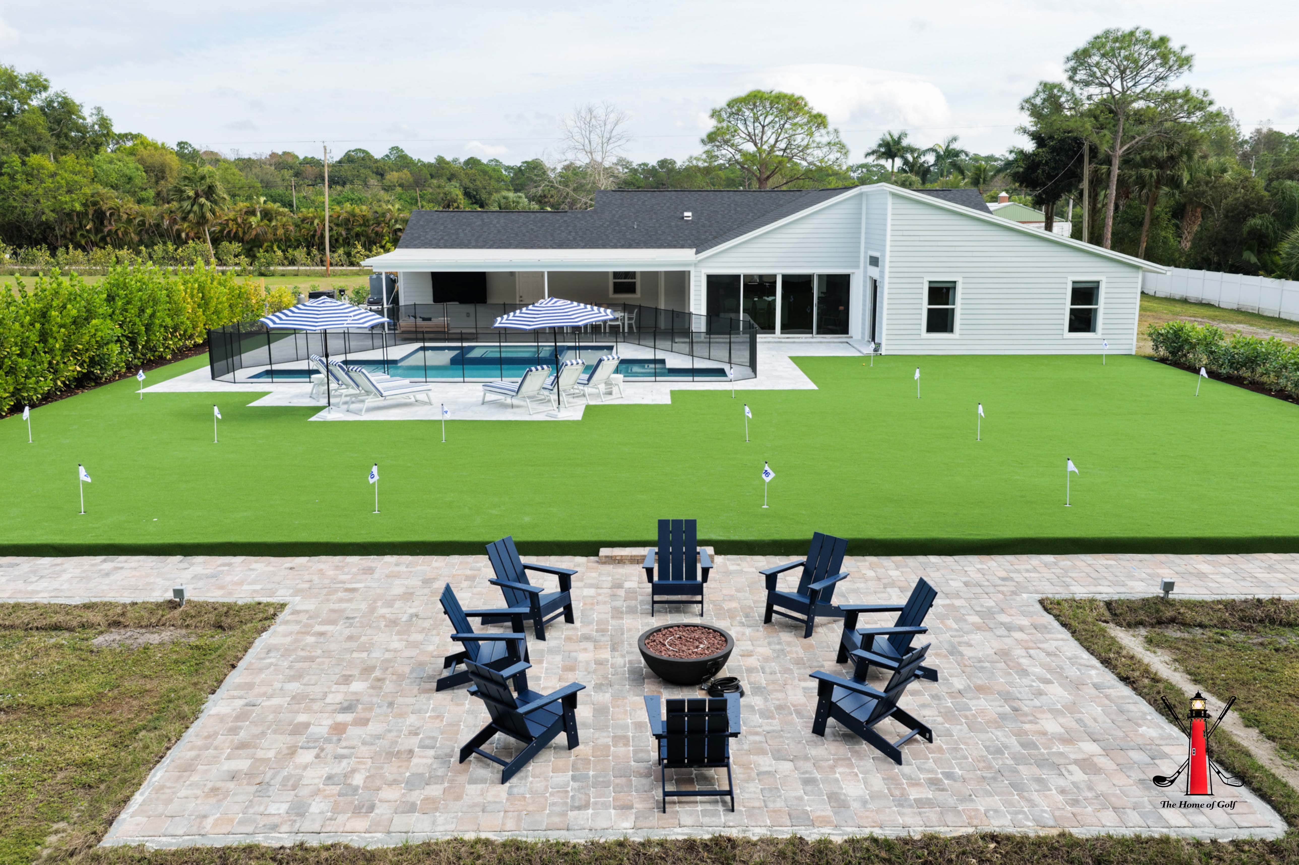 Gather around a warm, crackling fire pit for unforgettable evenings under the stars, overlooking your private 18-hole putting green and resort-style pool.