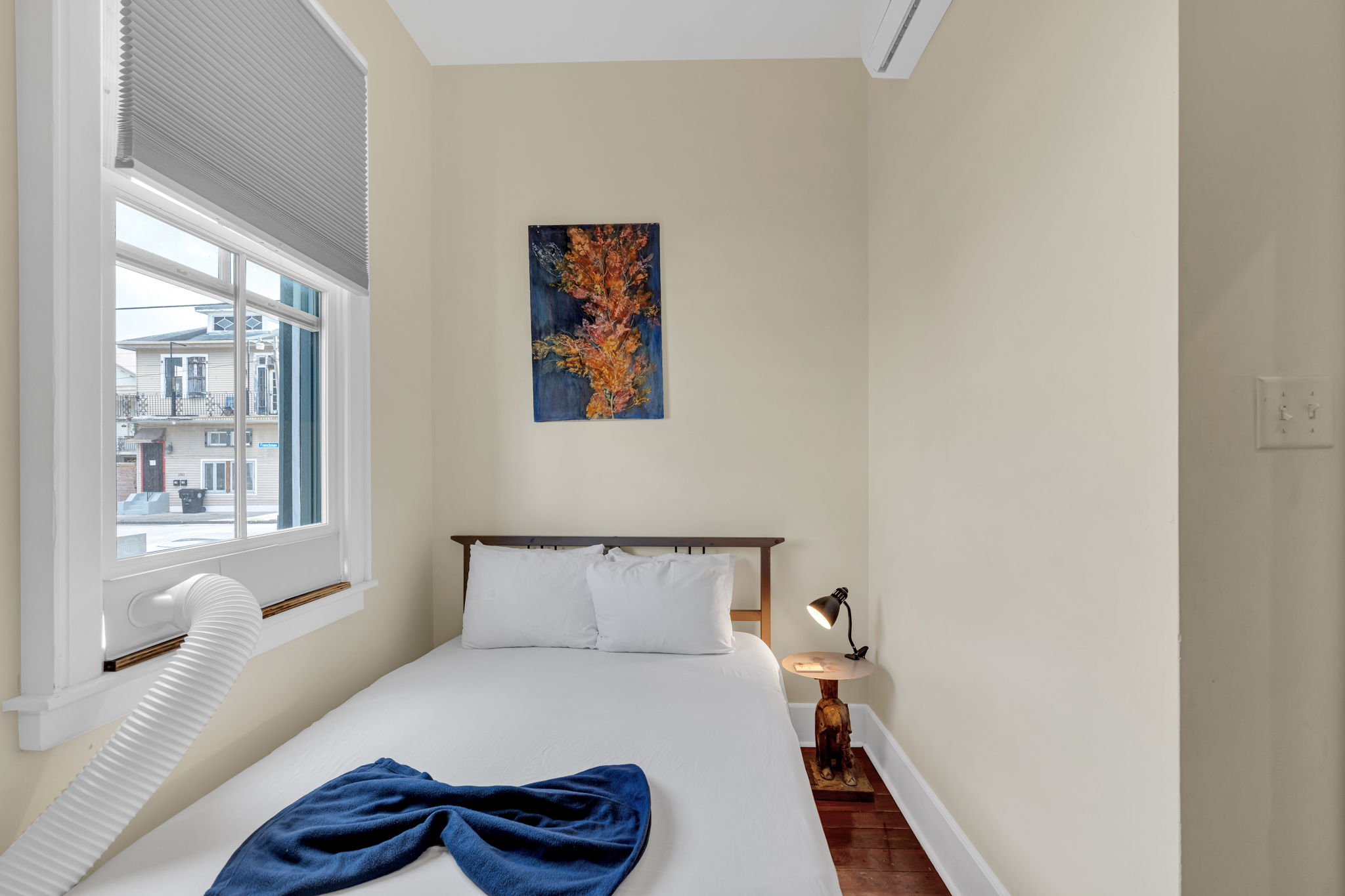 Bedroom-2: Bright guest bedroom with peaceful natural light