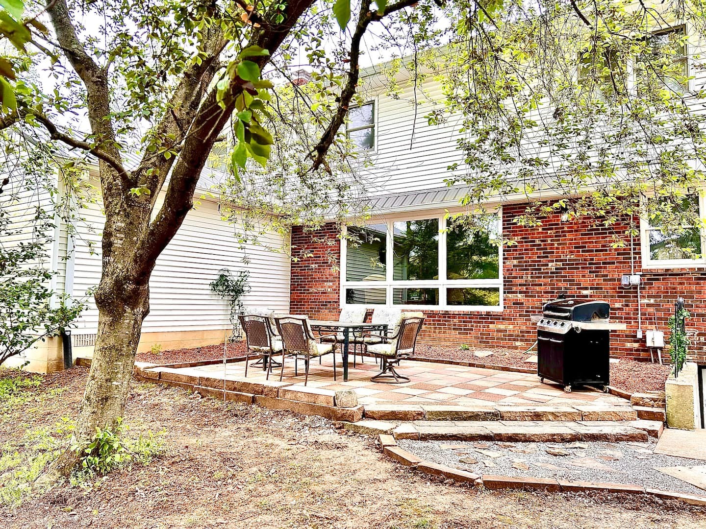 Stone patio with grill
