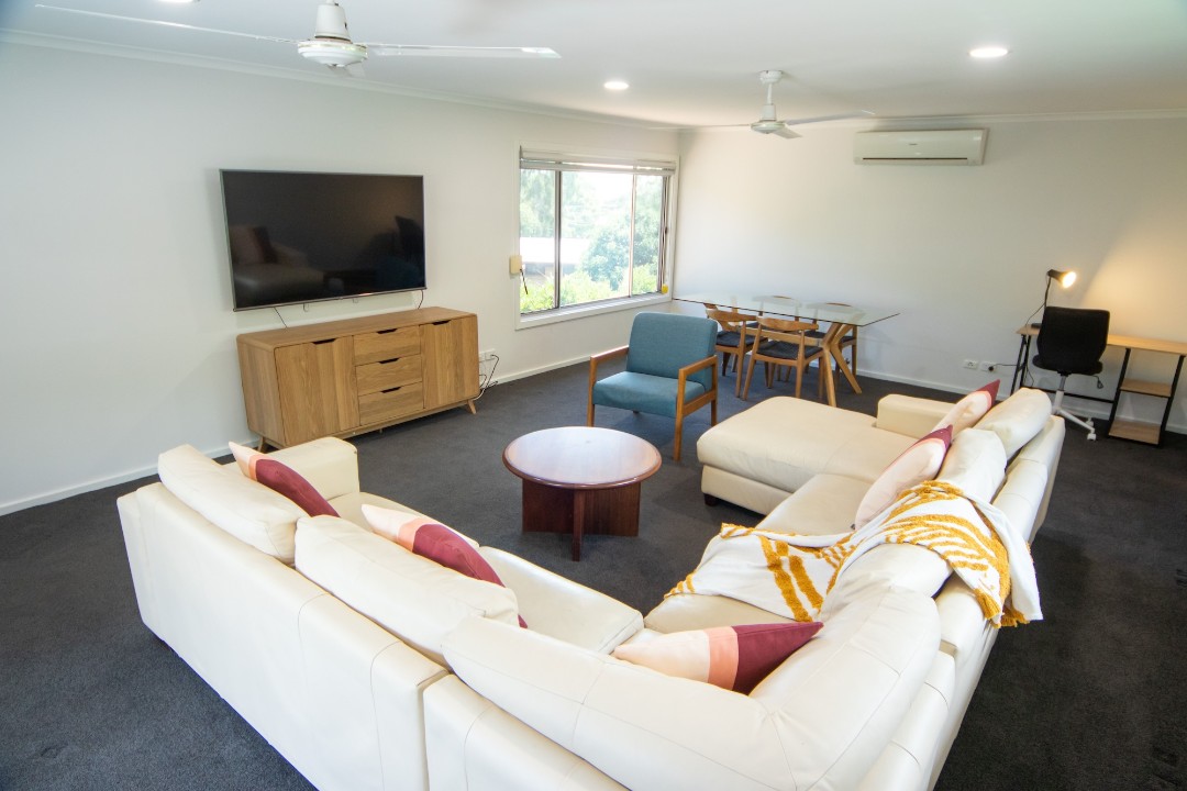 Two distinct lounge areas across two levels – formal living downstairs and a family retreat upstairs 
