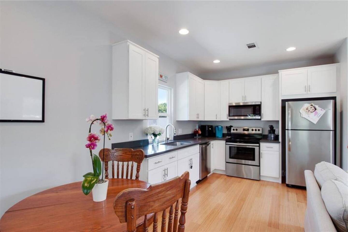 dining room area with a view of the kitchen