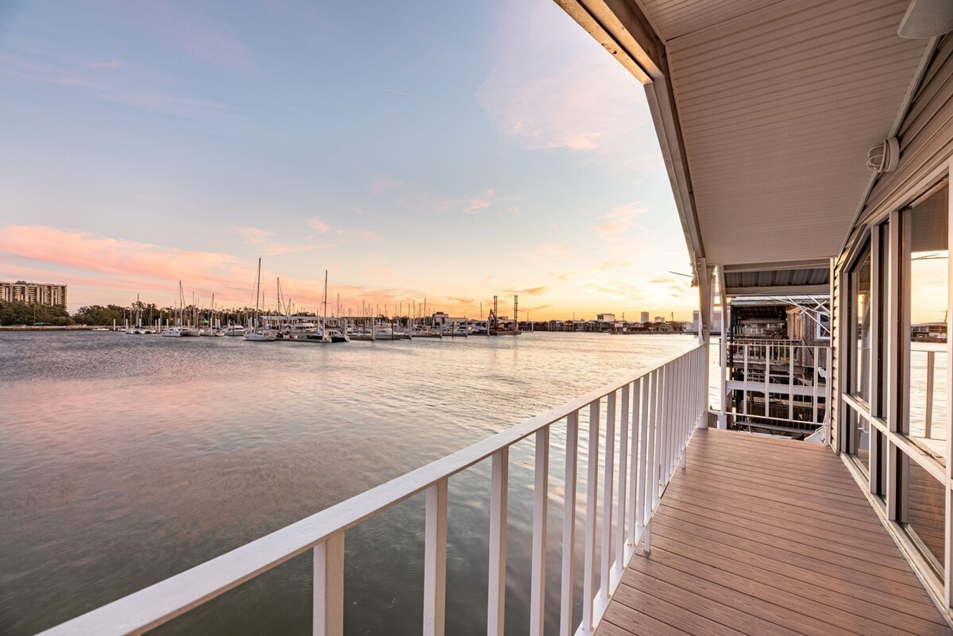 Rear-facing balcony off of master bedroom with view of Southern Yacht Club and the Lake Pontchartrain Marina.
