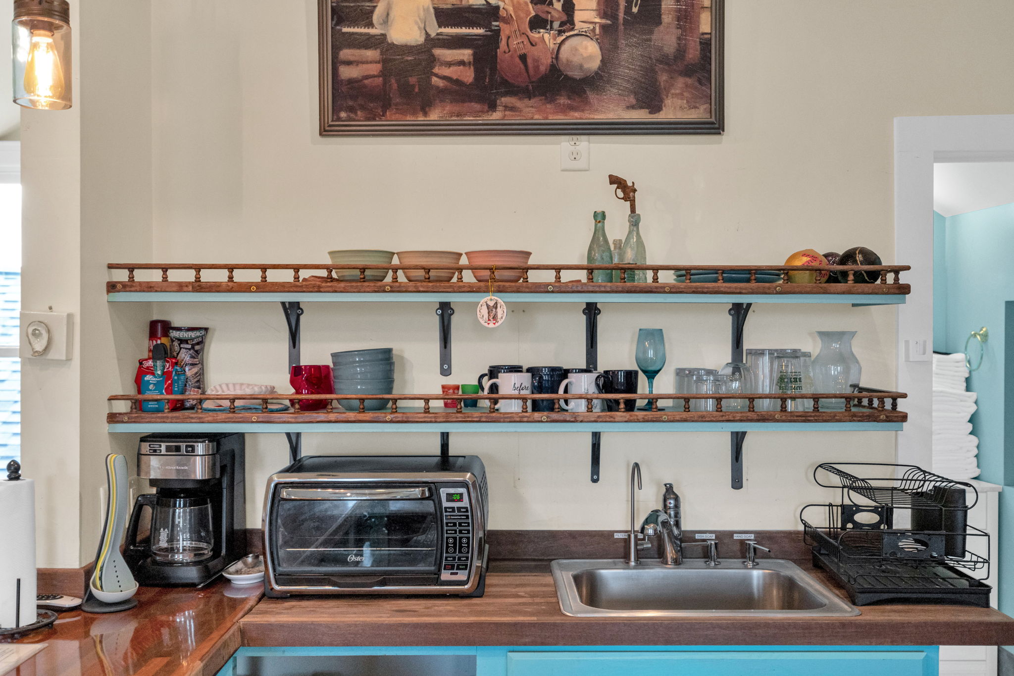 Open shelving stocked with everything for your stay.