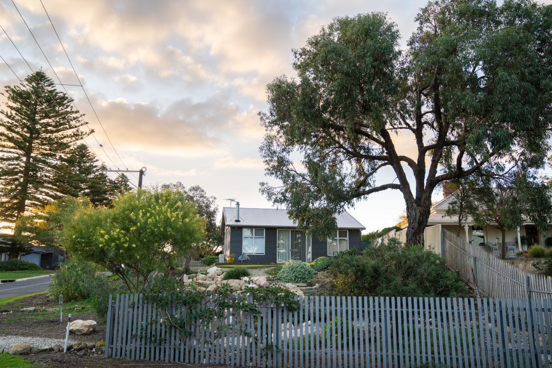 Welcoming to four-legged family members with a fully fenced backyard, offering both security and freedom for pets to roam safely.