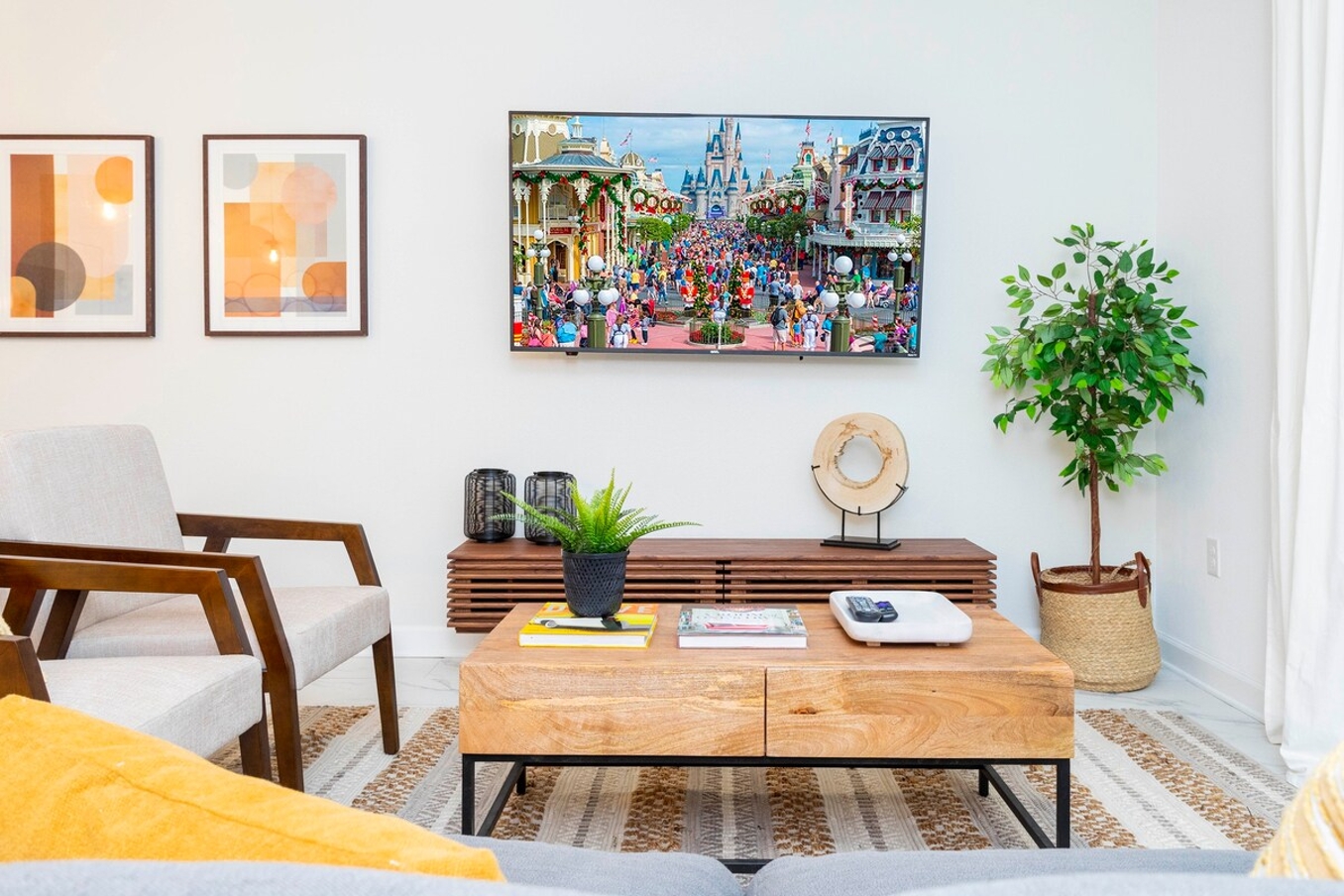 Step into this spacious, comfortable living area. The expansive room is adorned with tasteful decor, offering a blend of modern aesthetics and homey warmth. 