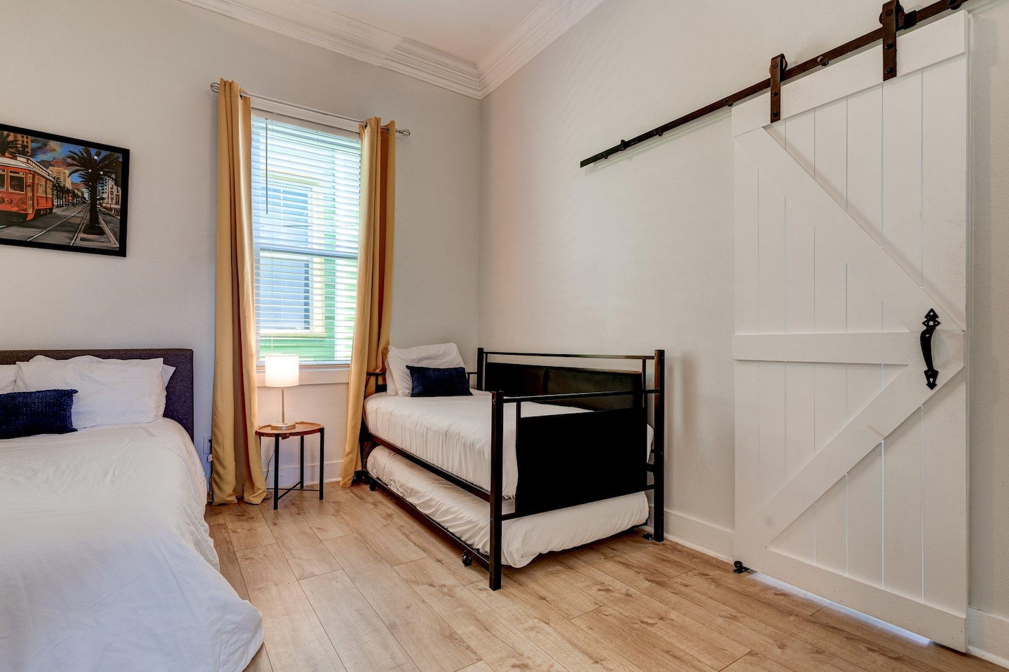 Two Twin Beds and One Full Size Bed in Second Bedroom