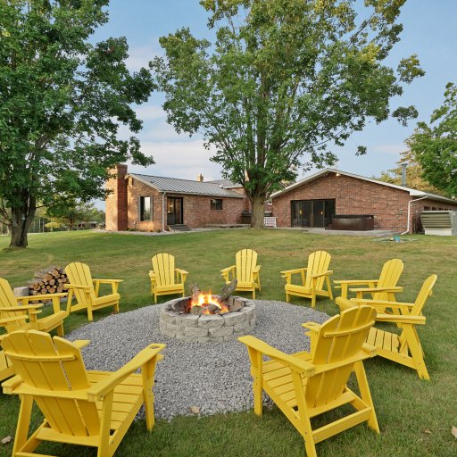 Outdoor fire pit with seating for the whole crew under Northern Michigan skies.