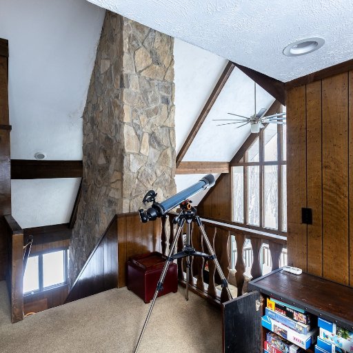 The open loft area offers beautiful views, natural light, and a peaceful spot to unwind