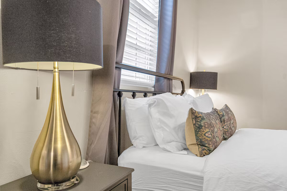 Bedroom 3 is bright and inviting, featuring a cozy full-size bed and thoughtful touches to make you feel at home.