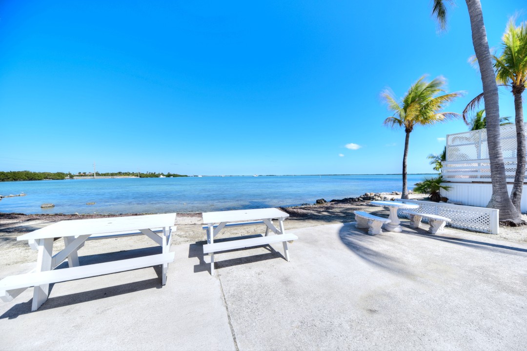 Windy Point Oceanfront in Geiger Key — Pool 1 picnic tables
