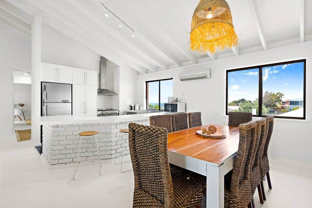 Spacious dining room, open plan living, family environment with ocean views.