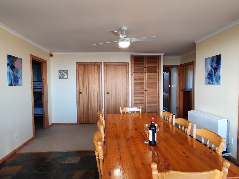 Equipped with a Creda heater in the dining area to keep things snug during cooler months, making it suitable for both summer and winter retreats. (Wine pictured is for styling purposes only.)