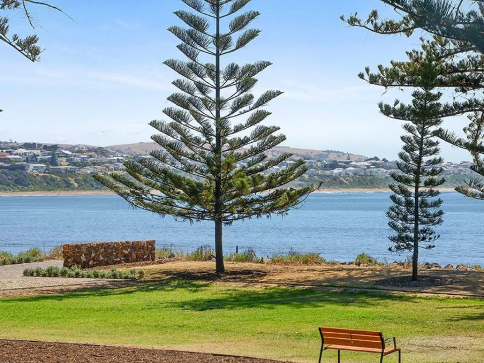 Positioned on Victor Harbor’s premier esplanade strip with uninterrupted Encounter Bay views.