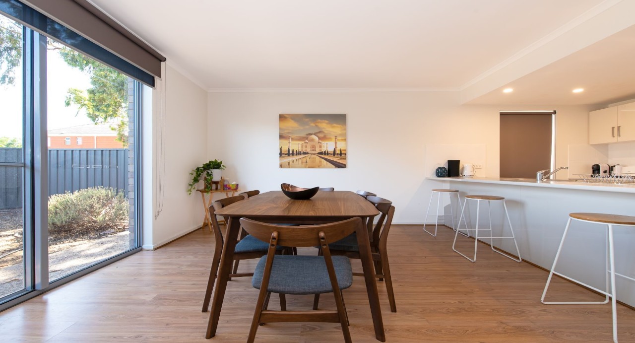 Fully equipped kitchen with Euro gas-top stove and dishwasher. New 6-seater wooden dining table for memorable shared meals.