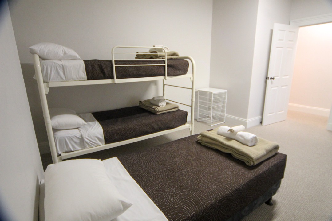 Sleeps 6-8 guests comfortably across two bedrooms plus a fold-out couch, ideal for couples or family getaways.